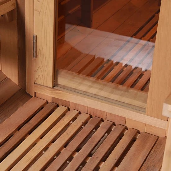 Elevate Performance Systems Cedar Ridge barrel sauna featuring Canadian red cedar wood and a tempered glass door.