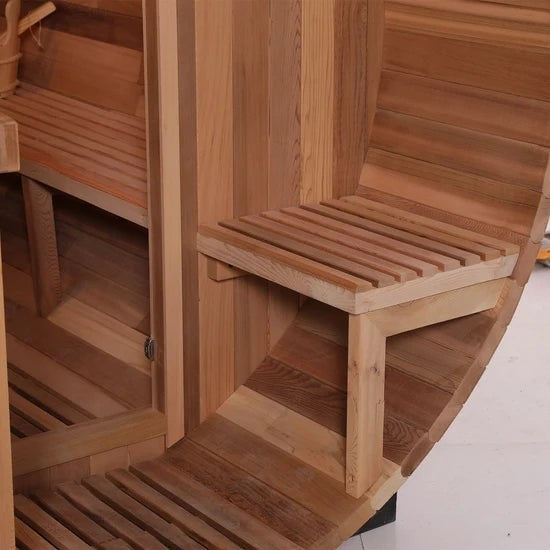 Elevate Performance Systems Cedar Ridge barrel sauna featuring a red cedar exterior bench and glass door entrance