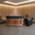 Elevate Performance Systems Haven cold plunge with red cedar exterior, stainless steel interior, and chiller unit.