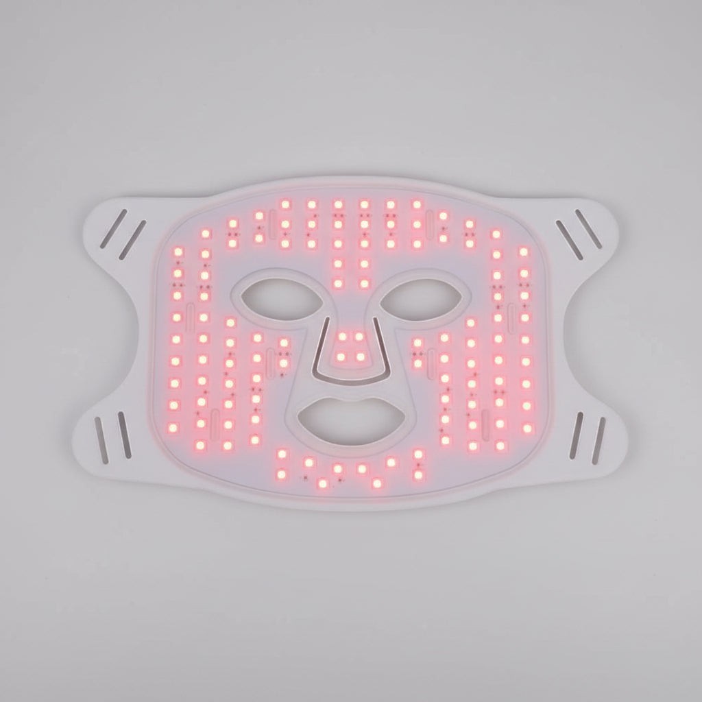 Elevate Performance Systems red light therapy facial mask made of flexible white silicone for skin rejuvenation.