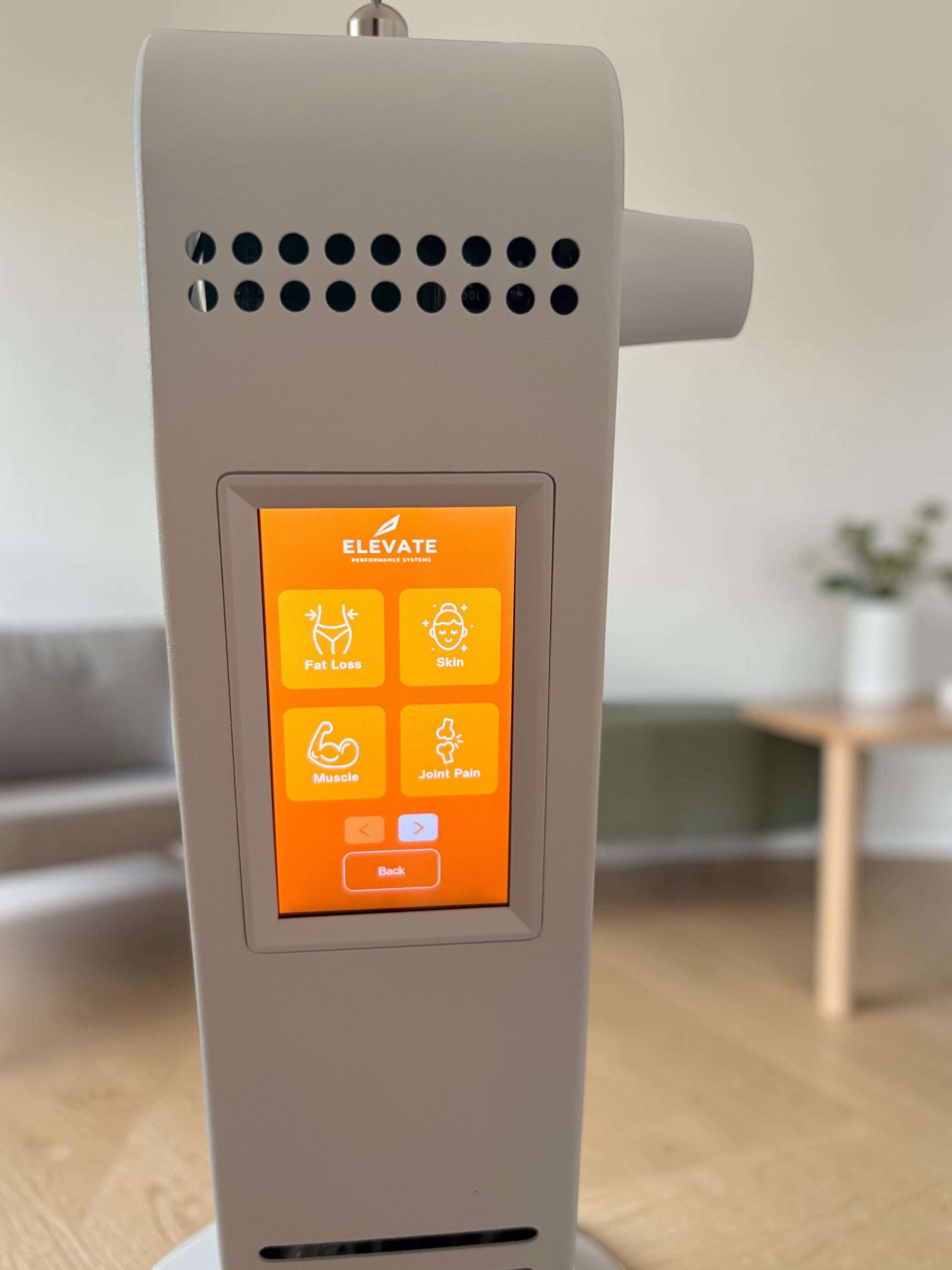 Elevate Performance Systems red light therapy panel with a digital touchscreen interface showing wellness settings.